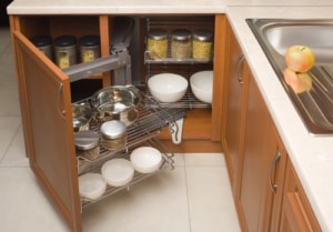 detail of open kitchen cabinet with cans of beans